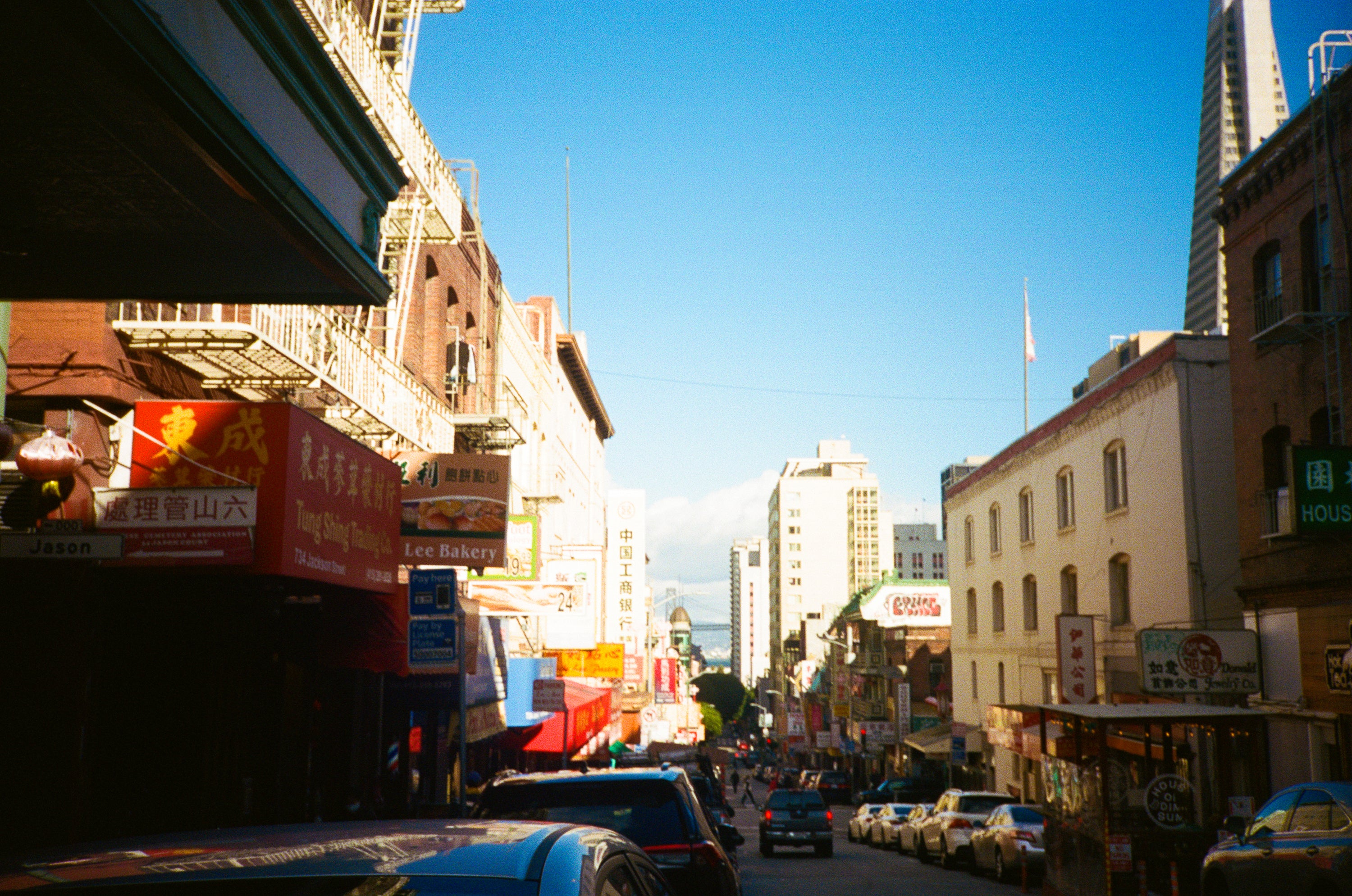 Jackson Street in Chinatown, San Francisco, looking east toward the bay, film photography by Loud Etudes